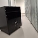 Druckerständer mit abschlissbaren Rollen - Bild 1